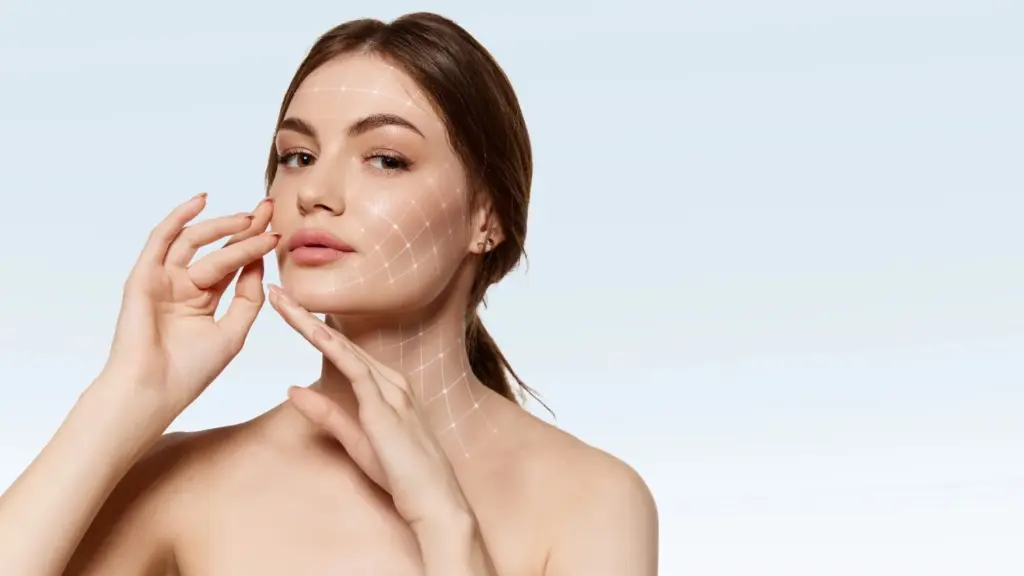 Portrait of a woman with smooth, clear skin touching her face, with a subtle grid overlay highlighting facial contours, suggesting skin tightening or thread lift treatment.